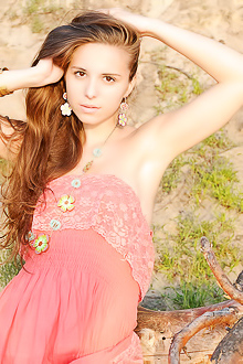 Cute Nensi with long red hair gets nude outdoors