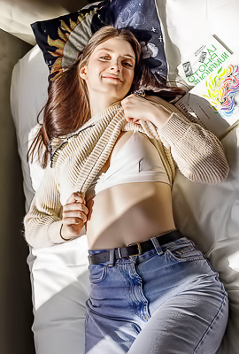 Marion Summers Warmed By The Sunshine Streaming Through The Windows