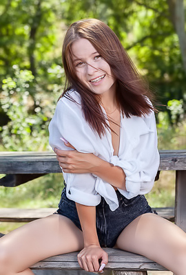 Skye Bloom Perching On A Picnic Table In The Park