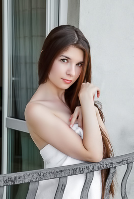 Donita Thighs Parted To Frame The Fluffy Curls Between Them