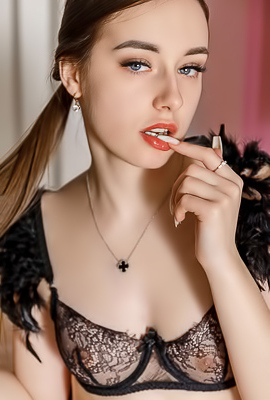 Lotty Enticing Lingerie Tease With Feathered Adornments And Flirty Poses
